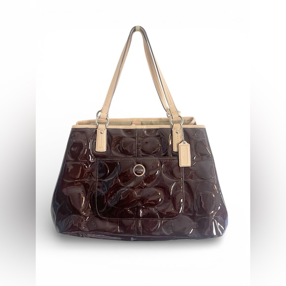 Coach Peyton embossed patent leather tote chocolatebrown color with tan trim.